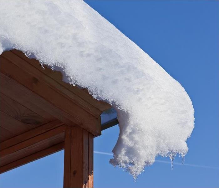 Gutter snow buildup on a Blue Ridge roof.